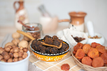 Dark muscovado cane sugar in a bowl.
