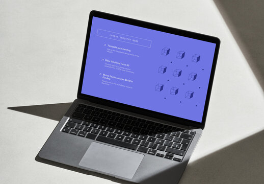 Laptop on a Concrete Surface with Sun Light