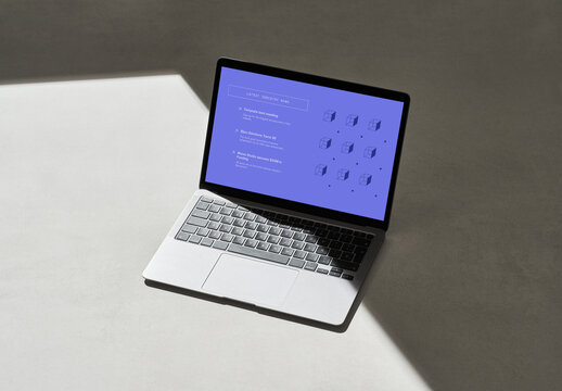 Laptop on a Grey Background with Shadows