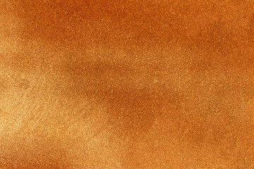 Orange gold glitter background texture. 