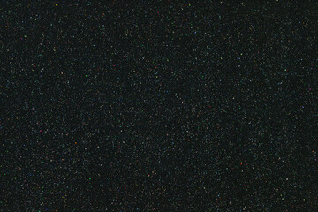 Fototapeta premium Black glitter luxury festive texture background.