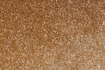 Gold glitter shiny bright texture background.