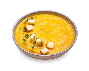 Bowl of tasty pumpkin cream soup on white background