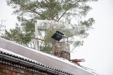 Close up chimney on the roof red brick