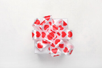 Gift box for Valentine's Day on light background