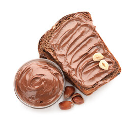 Bread with chocolate paste and hazelnuts on white background