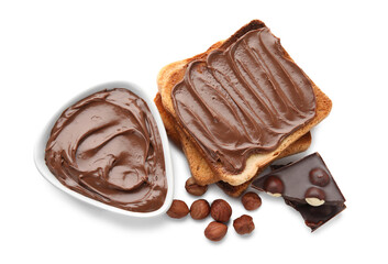 Bread with chocolate paste and hazelnuts on white background
