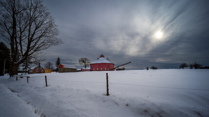 in the Eastern Townships countryside, the round barn has become rarer. The last of the village of West Brome in winter.