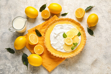 Delicious lemon tart on grunge background