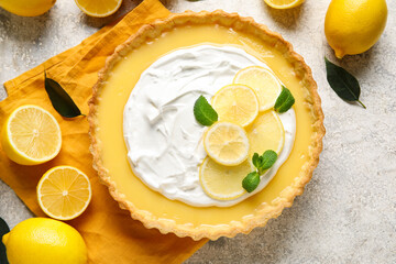 Delicious lemon tart on grunge background