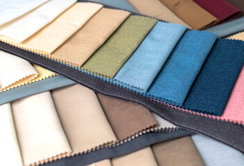 Samples of fabrics in different tones. The choice of fabrics for interior decoration. Palette