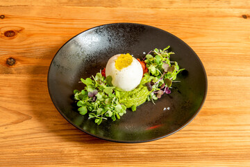 Burrata is a fresh cow's milk cheese, made of spun paste and round in shape, with an external...