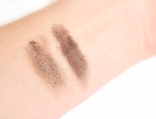 Fototapeta premium Cosmetics Sample Test on Womans Arm Warm Colors
