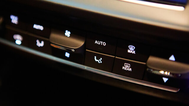 Selector button switch of the air conditioner system on car dashboard