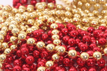 Red and Gold Holiday Bead Decortations. Christmas Background