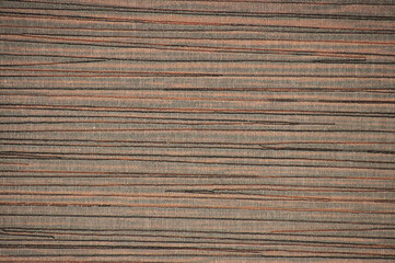 Close-up of roughly finished surface of natural dark wood.