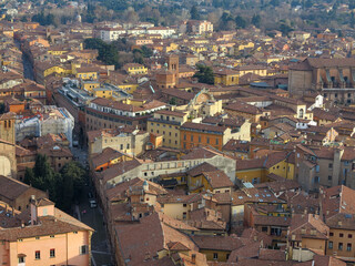 Fototapeta na wymiar An aerial view of Bologna's cityscape as seen from the Asinelli Tower.