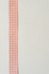 paper strip with plaid pattern and blank space