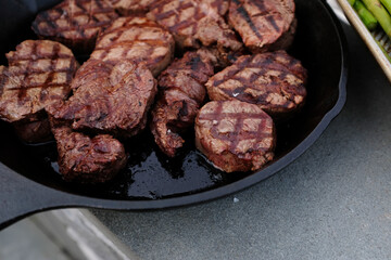 filet mignon on the cast iron pan with perfect grill marks