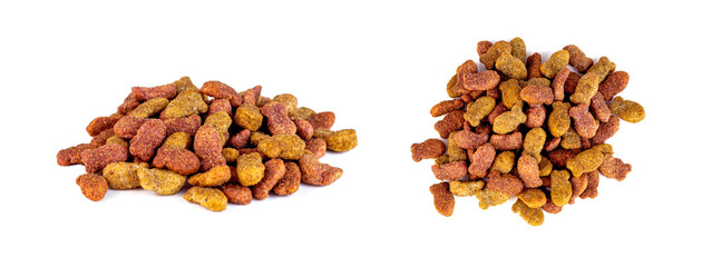 Brown kibble pieces for cat feed heap set isolated on white background. Healthy dry pet food.