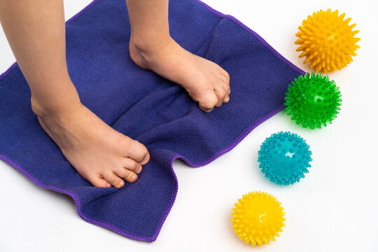 prevention of children's flat feet and hallux valgus, exercises with tissue and massage balls 