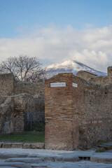 Fototapeta na wymiar Ruines of the ancient Roman city of Pompeii and mount Vesuvius in the winter evening, Italy