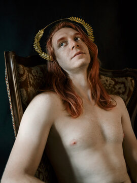 Redhead with golden halo and long hair