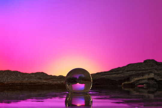 Lensball in sunset from a mountain
