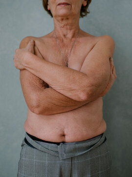 Senior female cover breasts portrait face