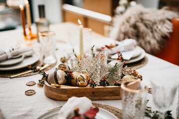 Rustic warm Christmas table with ornament