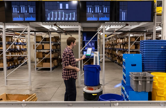 E-Commerce Warehouse Distribution with robots in use 