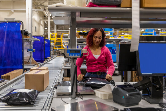 Factory warehouse worker with scanner 