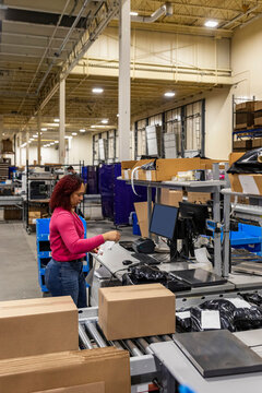Business image of worker at online shopping warehouse