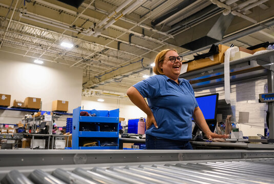 Portrait of Smiling employee at factory warehouse 
