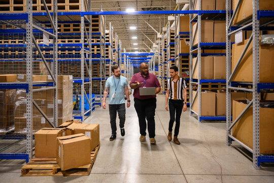 African American Manager meeting with employees 