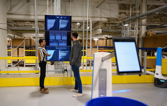 Informal Meeting at E-Commerce Warehouse Distribution - Powered by Adobe