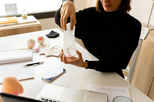 Gynecologist testing female condom