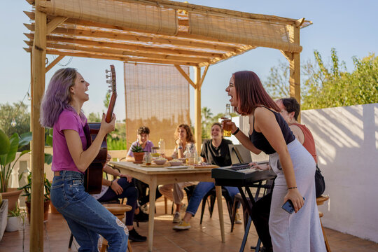 Teens having fun at outdoor party