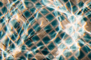 swimming pool mosaic tile underwater light rays
