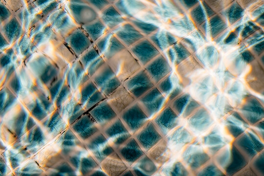 swimming pool mosaic tile underwater light rays