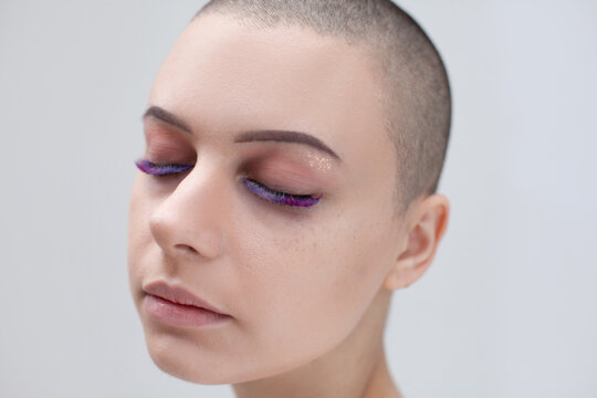 Young Bald Woman With Bright Makeup