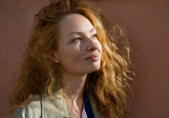 Redheaded woman outdoors