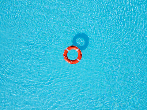 help concept, life buoy in swimming pool