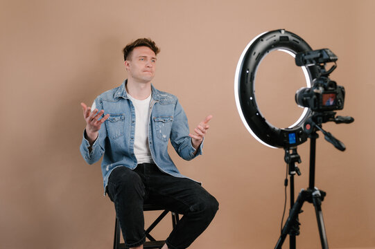 Man recording video with ring lamp