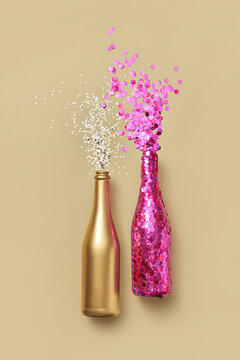 Colorful confetti flying out from champagne bottles