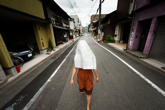 Tired tourist walking on the street