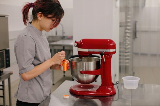 Baker making dough in mixer
