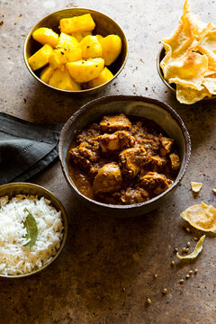 Indian Curry with Potatoes, Rice and Papadum 