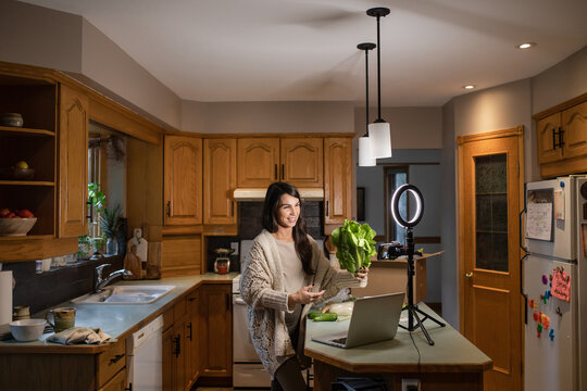A Woman Make Video With Vegetables