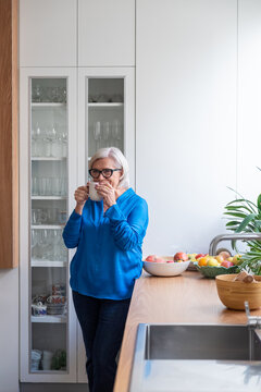 Female drinking coffee in morning